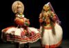 Classical Kathakali performer from Kerala wearing Pacha green makeup and traditional headgear
