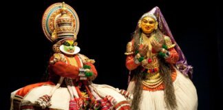 Kathakali; The Timeless Classical Dance-Drama Heritage of Kerala,Discover Kathakali, Kerala’s classical dance-drama, featuring dramatic makeup, mudras, archetypes, and rich cultural heritage. Classical Kathakali performer from Kerala wearing Pacha green makeup and traditional headgear